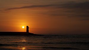 Preview wallpaper lighthouse, sunset, sun, sea, horizon