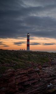 Preview wallpaper lighthouse, tower, cliff, twilight
