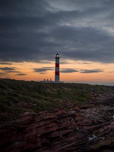 Preview wallpaper lighthouse, tower, cliff, twilight