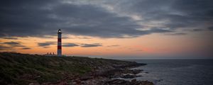 Preview wallpaper lighthouse, tower, cliff, twilight