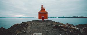 Preview wallpaper lighthouse, tower, coast, rocks, stones