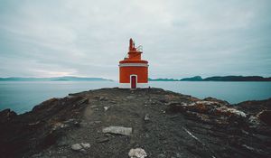 Preview wallpaper lighthouse, tower, coast, rocks, stones