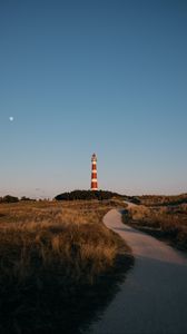 Preview wallpaper lighthouse, tower, road, grass, landscape