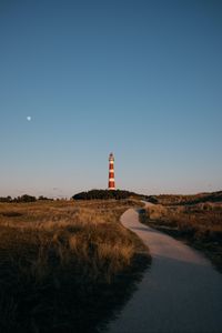 Preview wallpaper lighthouse, tower, road, grass, landscape