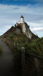 Preview wallpaper lighthouse, tower, road, hill, landscape