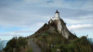 Preview wallpaper lighthouse, tower, road, hill, landscape