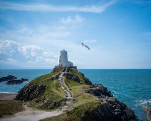 Preview wallpaper lighthouse, tower, rock, sea, landscape