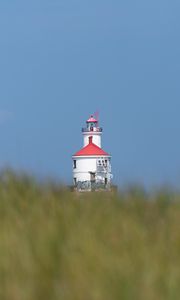Preview wallpaper lighthouse, towers, grass, field, blur