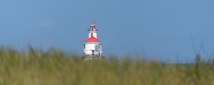 Preview wallpaper lighthouse, towers, grass, field, blur