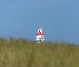 Preview wallpaper lighthouse, towers, grass, field, blur