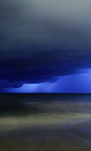 Preview wallpaper lightning, blow, sky, dark blue, gloomy, clouds, storm, sea