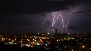 Preview wallpaper lightning, city, night, sky, clouds