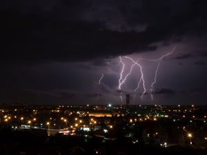 Preview wallpaper lightning, city, night, sky, clouds