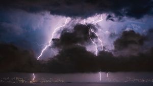 Preview wallpaper lightning, clouds, sea, night, storm