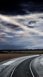 Preview wallpaper lightning, road, asphalt, elements, sky, bad weather, car, movement, category