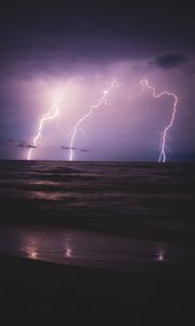 Preview wallpaper lightning, sea, horizon, night, overcast