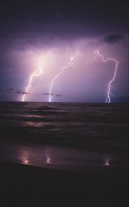 Preview wallpaper lightning, sea, horizon, night, overcast