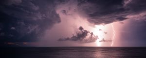Preview wallpaper lightning, sea, horizon, clouds, glare