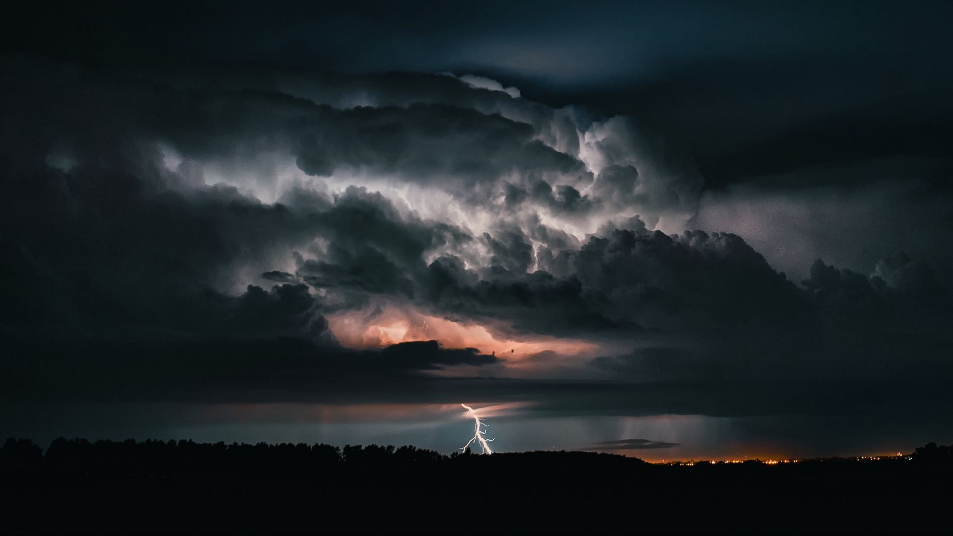 Download Lightning Storm Fills The Night Sky Wallpaper  Wallpaperscom