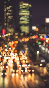 Preview wallpaper lights, bokeh, blur, city, cars, road