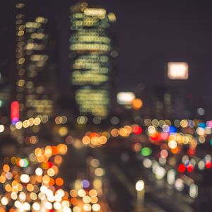 Preview wallpaper lights, bokeh, blur, city, cars, road