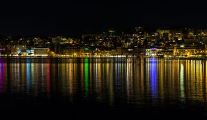 Preview wallpaper lights, buildings, sea, night, dark