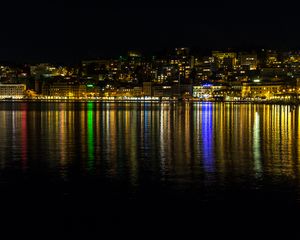 Preview wallpaper lights, buildings, sea, night, dark