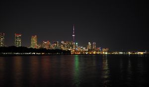 Preview wallpaper lights, buildings, tower, sea, night, city