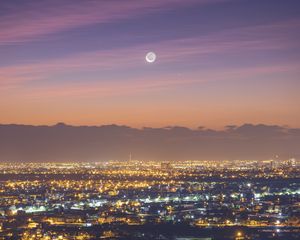 Preview wallpaper lights, city, buildings, sky, clouds, moon