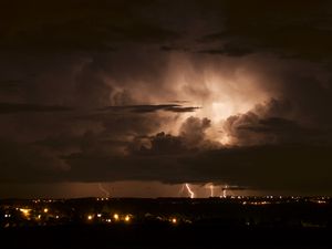 Preview wallpaper lights, city, lightning, clouds, night