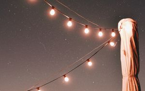 Preview wallpaper lights, garlands, starry sky