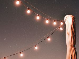 Preview wallpaper lights, garlands, starry sky