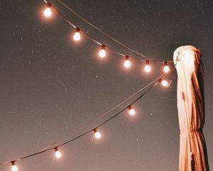 Preview wallpaper lights, garlands, starry sky