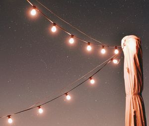 Preview wallpaper lights, garlands, starry sky