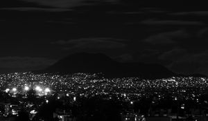 Preview wallpaper lights, mountains, city, night, black