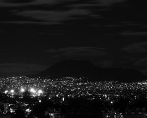 Preview wallpaper lights, mountains, city, night, black