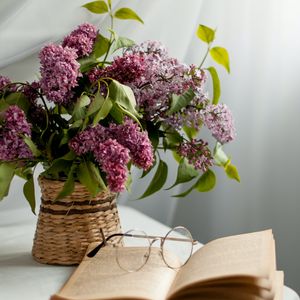 Preview wallpaper lilac, flowers, book, glasses