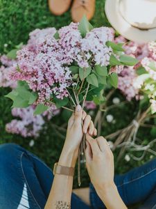 Preview wallpaper lilac, flowers, girl, hands, tattoo