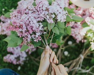 Preview wallpaper lilac, flowers, girl, hands, tattoo