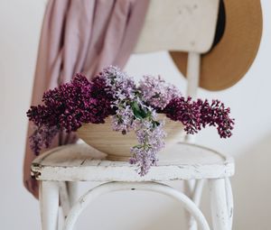 Preview wallpaper lilac, flowers, pot, chair, hats, aesthetics