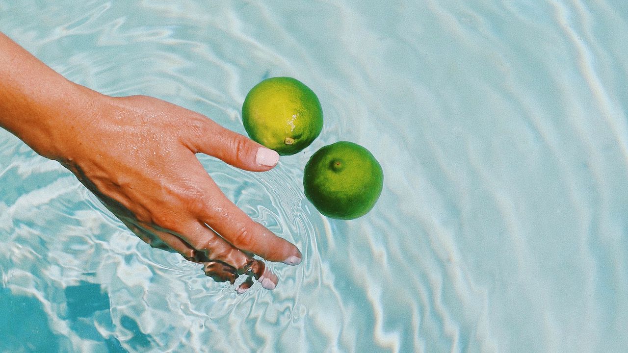 Wallpaper lime, citrus, fruit, hand, water, spray