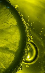 Preview wallpaper lime, wedge, water, bubbles, green