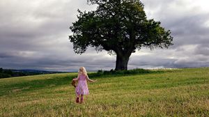 Preview wallpaper little girl, field, tree, mood