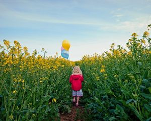 Preview wallpaper little girl, meadow, mood, balloons