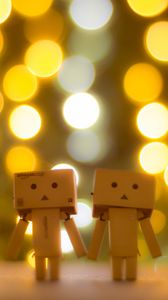 Preview wallpaper little men, robots, light, bokeh