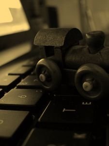 Preview wallpaper locomotive, keyboard, surface, notebook, toy