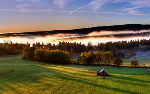Preview wallpaper lodge, lonely, field, open spaces, green, height, wood, distance, look, fog, sky, lines
