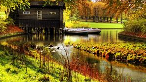 Preview wallpaper lodge, river, boats, pier, wood, garden, rods, colors