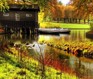Preview wallpaper lodge, river, boats, pier, wood, garden, rods, colors