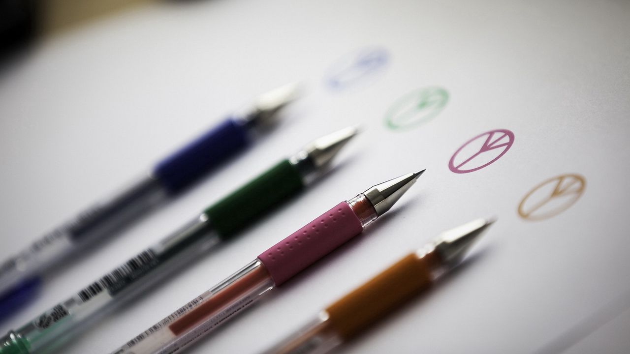 Wallpaper logo, pens, colored paper, drawing